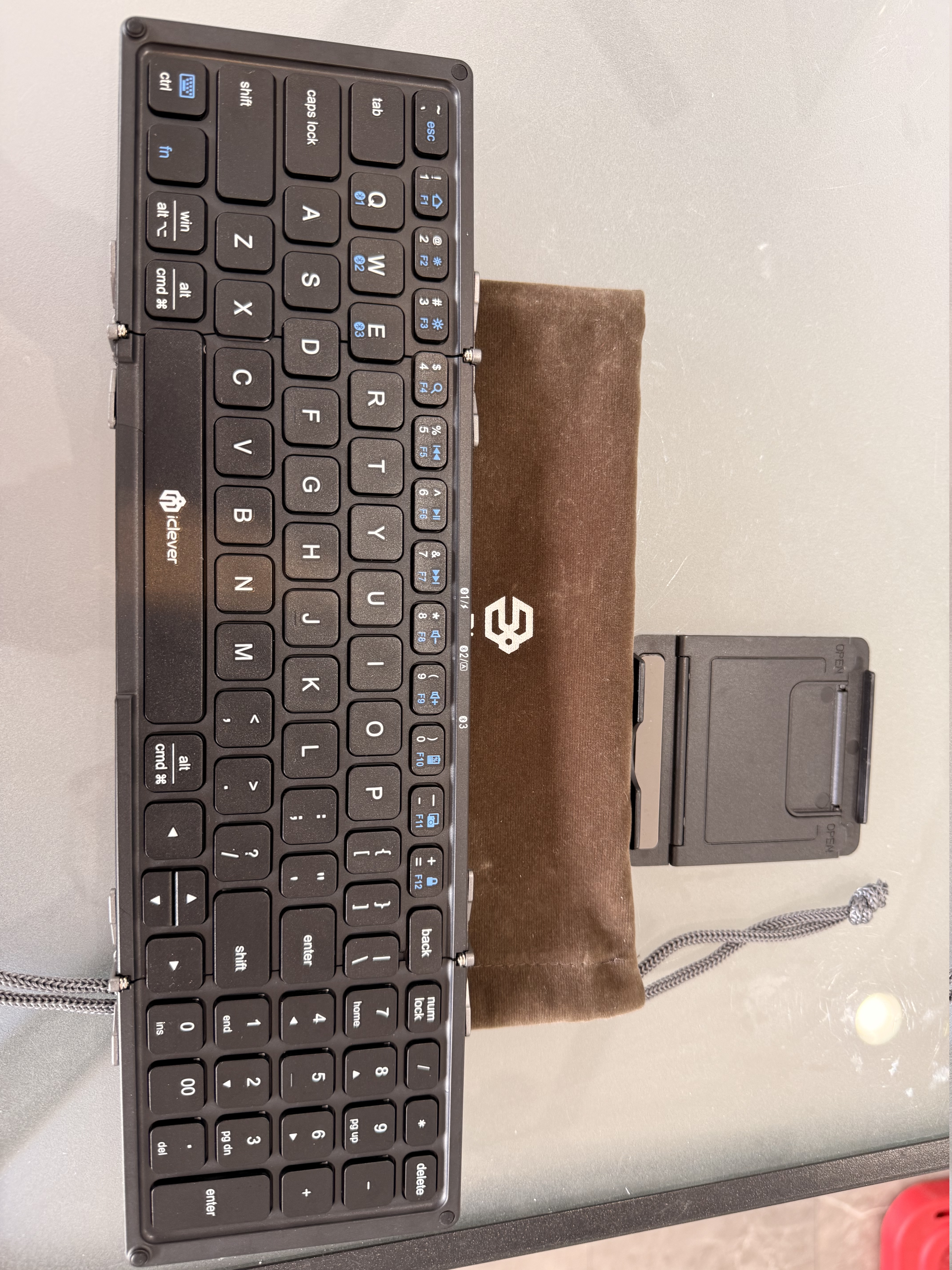 Portable Keyboard, BK09 Foldable Bluetooth Keyboard with Number Pad.